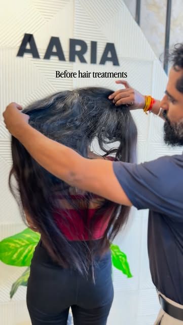 Stylist sectioning long hair before a treatment